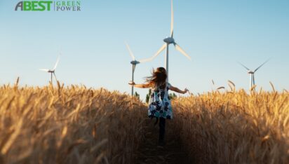 girl-is-running-the-way-to-wind-energy-picture-id1246137737