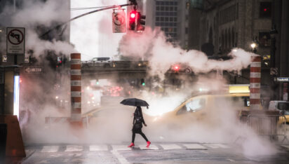 New York, USA, October 04, 2020. A woman wearing red high heels is crossing the 42nd street in Manhattan during the Covid-19 outbreak. Manhattan, New York City, United States.